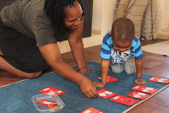 Mother and Child using Classified Cards